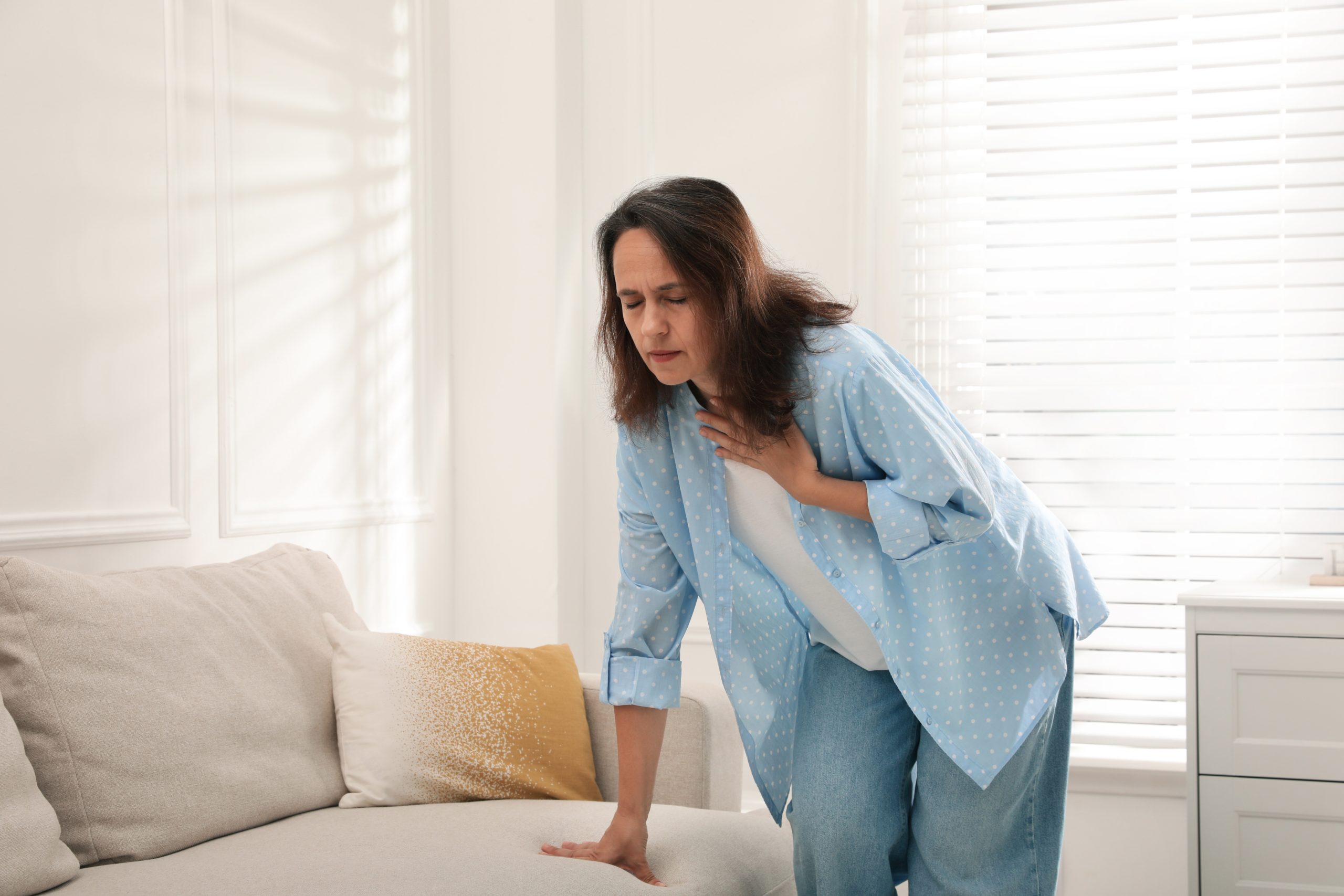 A woman with breathing difficulties.