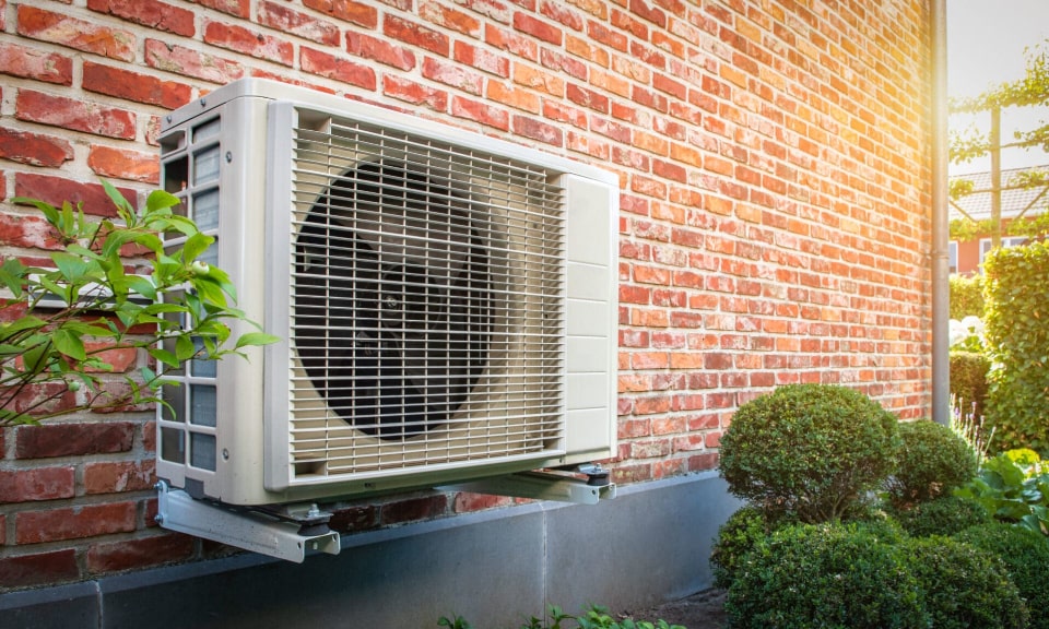 Outside wall-mounted heat-pump.
