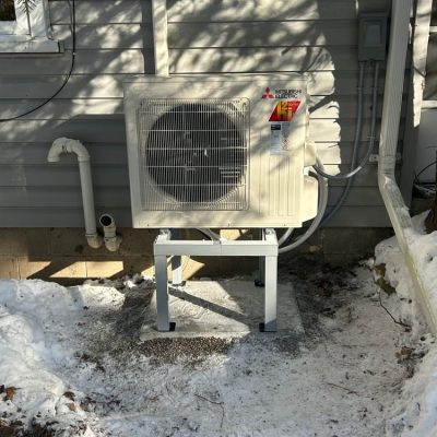 Mitsubishi Hyper-Heat ductless outdoor (snow stand).
